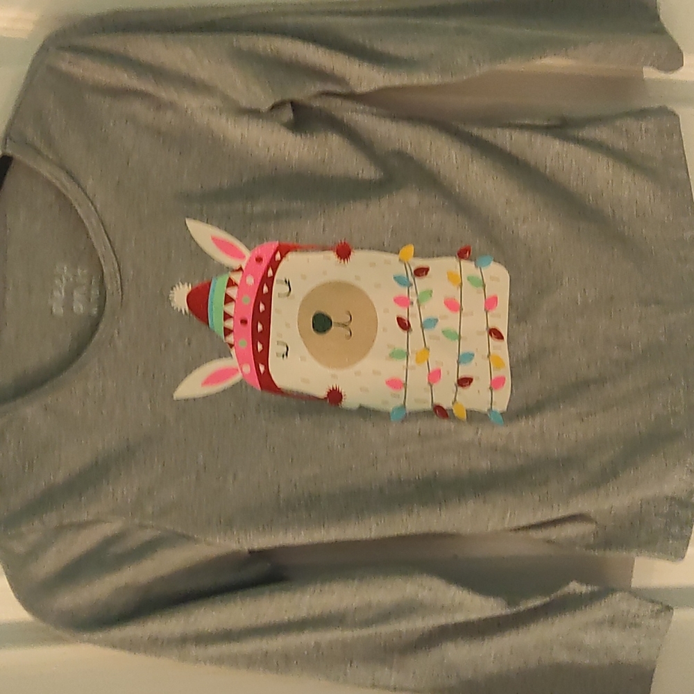 Winter sleepwear top for girls size (10/12).